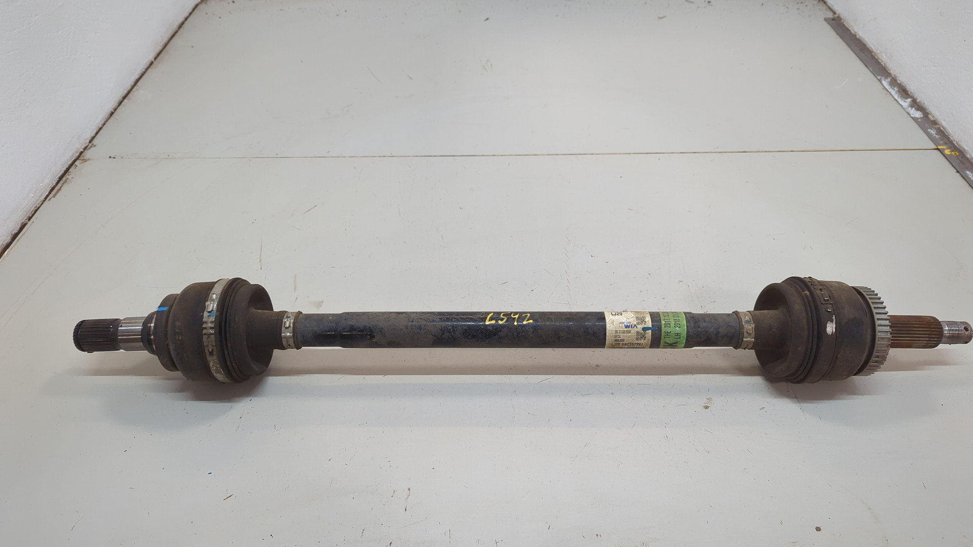 Полуось задняя левая