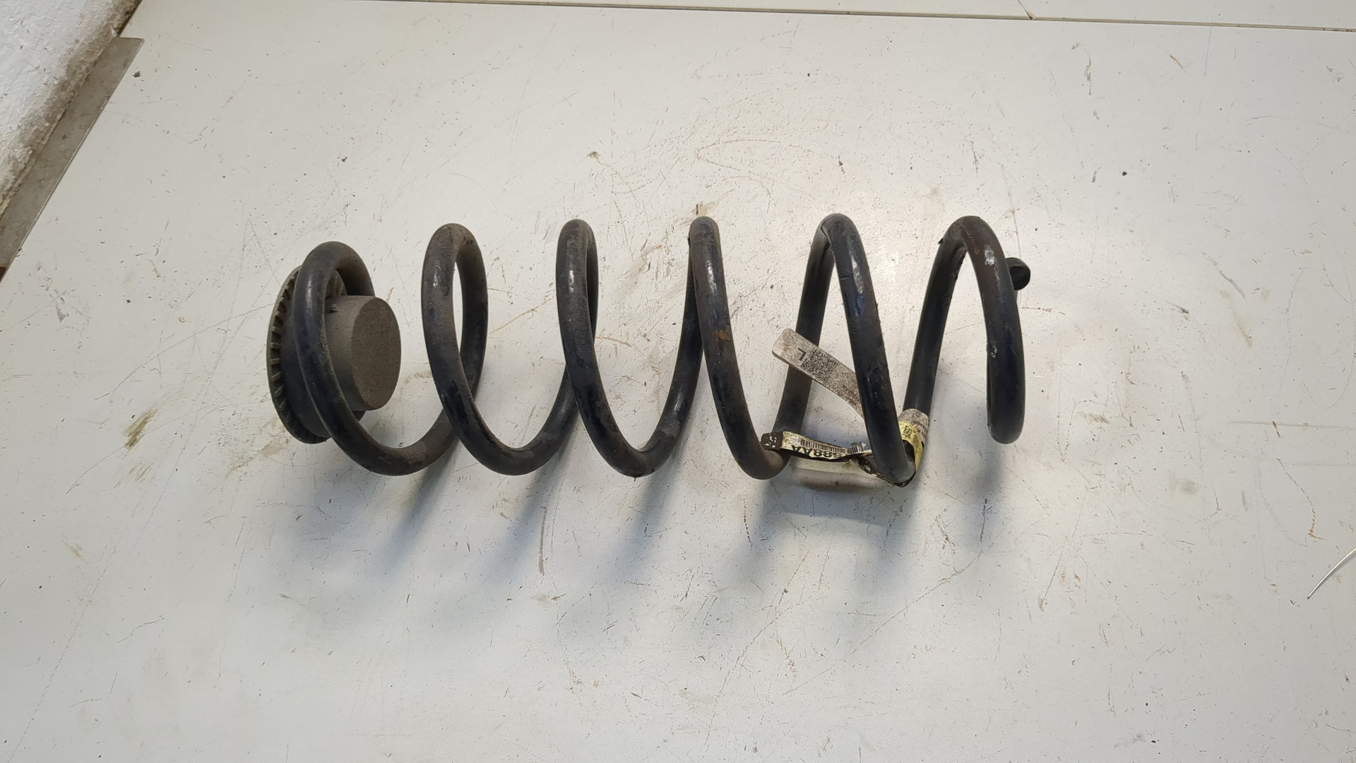 Пружина задняя