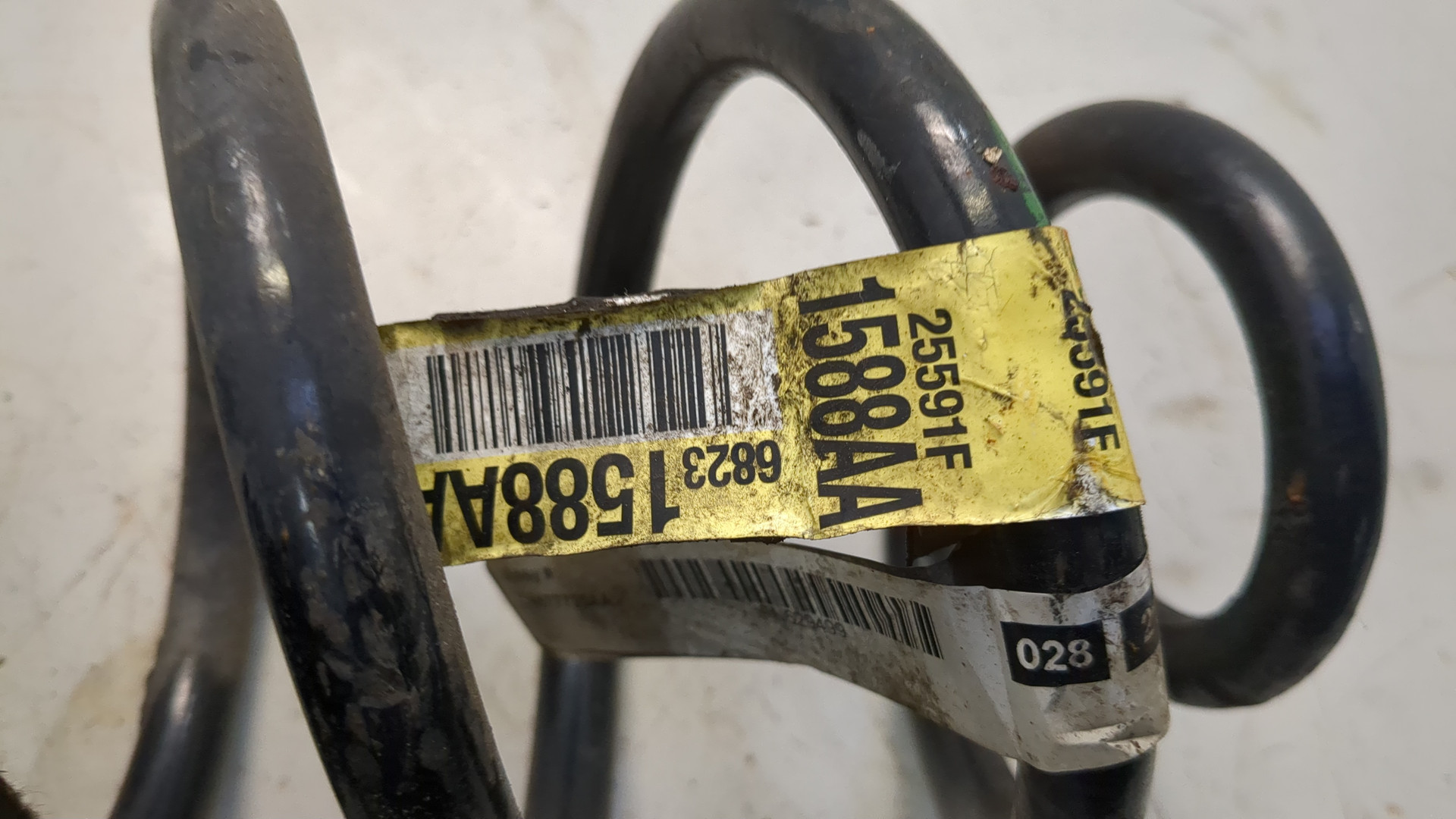 Пружина задняя