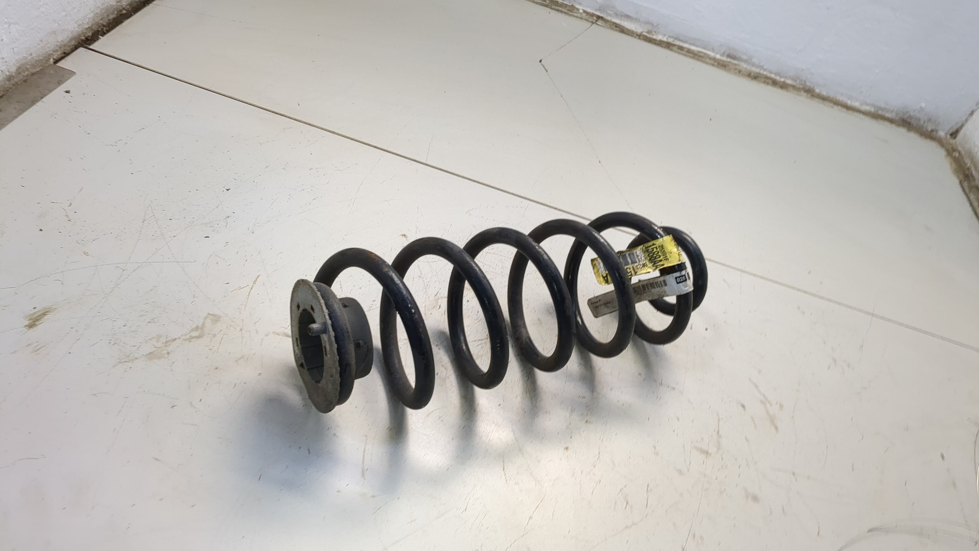 Пружина задняя