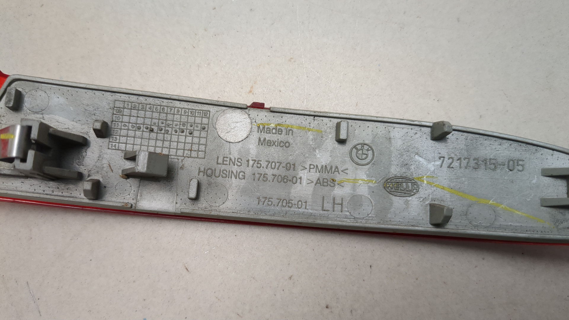 Отражатель в бампер задний левый