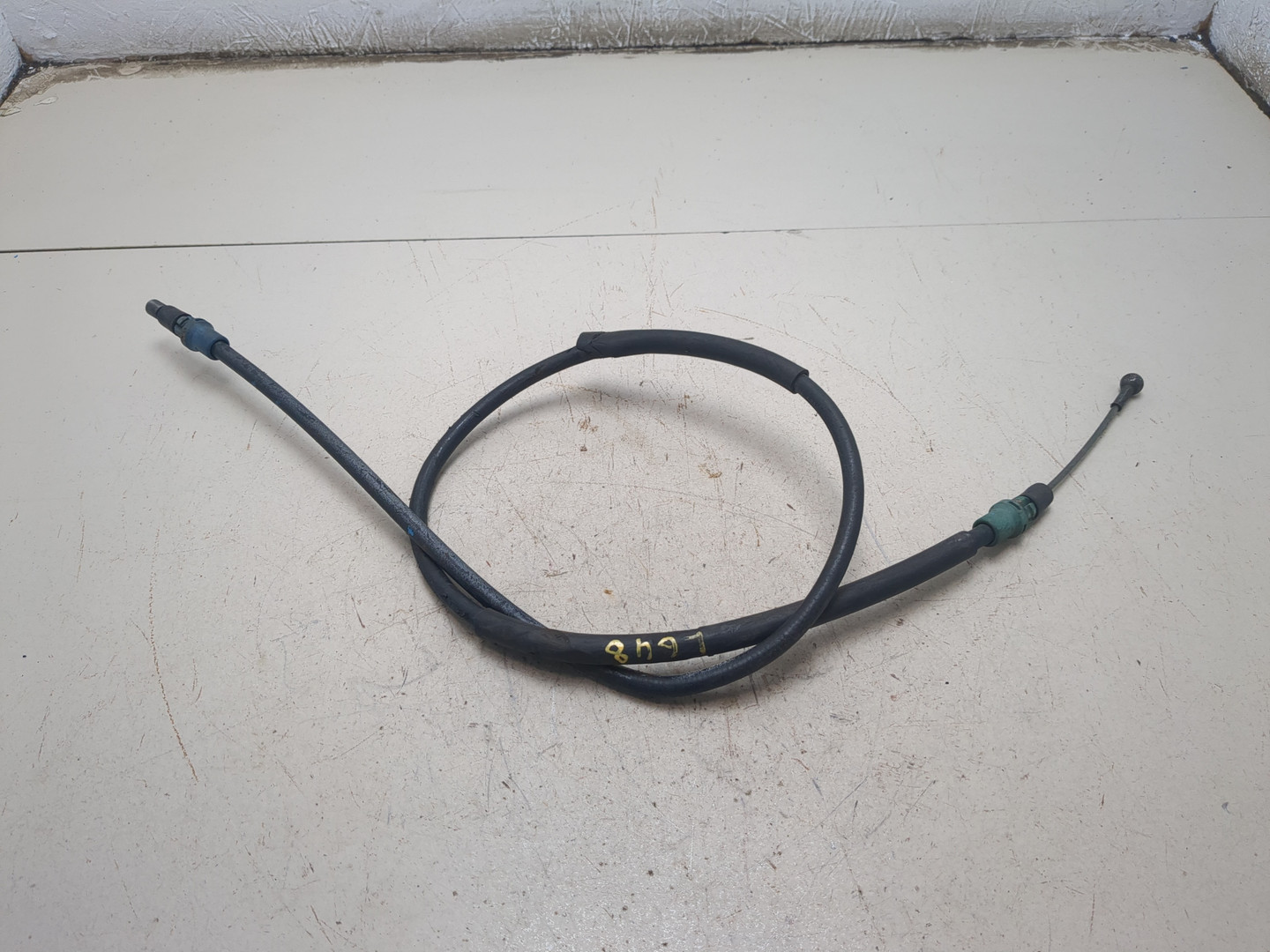 Трос стояночного тормоза