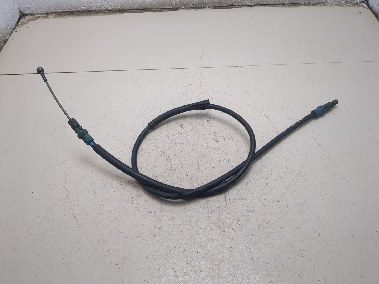 Трос стояночного тормоза