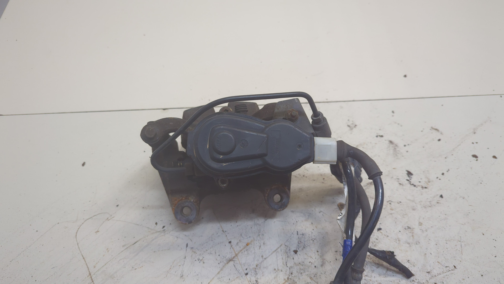 Суппорт задний левый