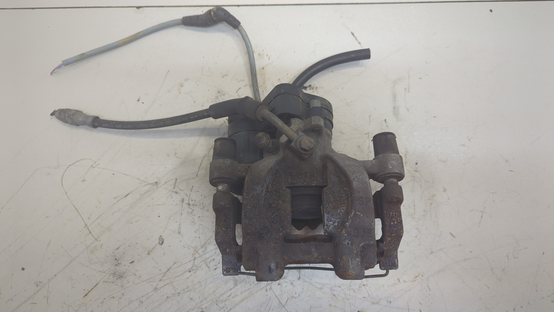 Суппорт задний левый