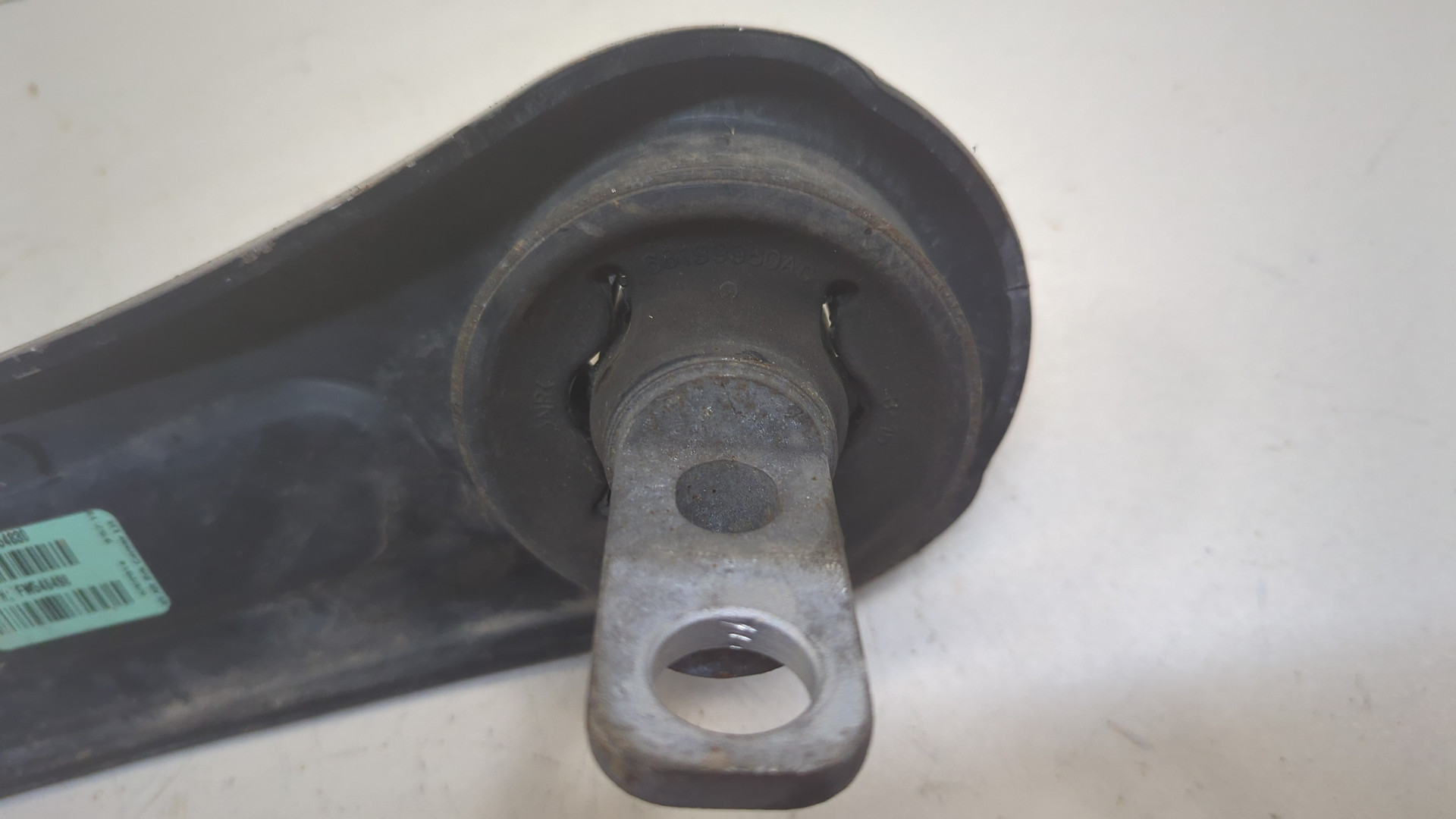 Рычаг задний левый