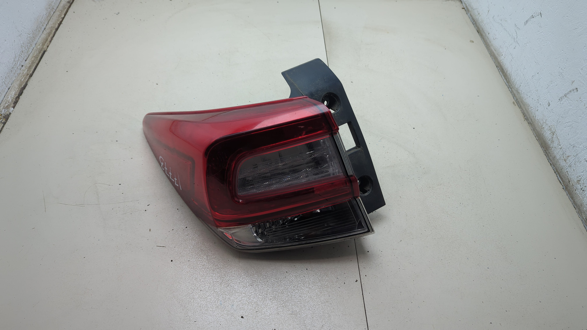 Фонарь задний левый