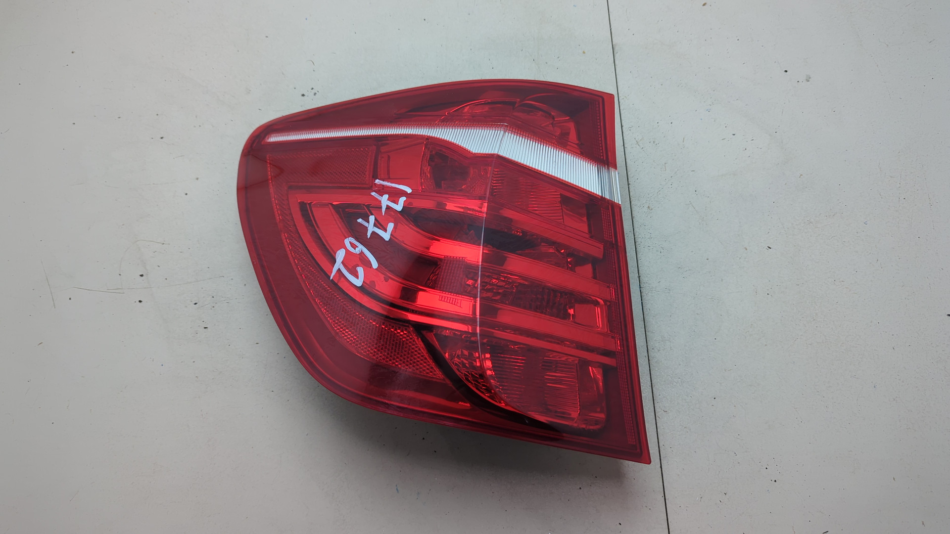 Фонарь задний левый