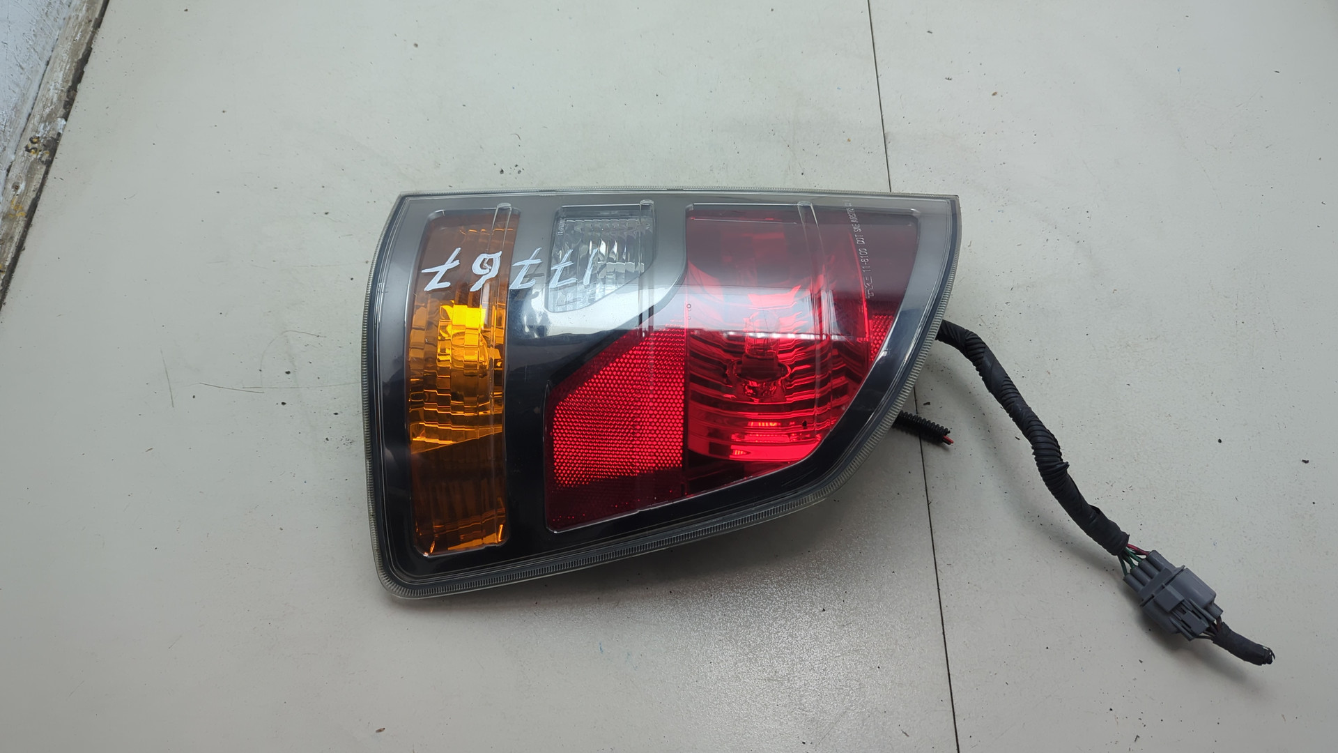 Фонарь задний левый