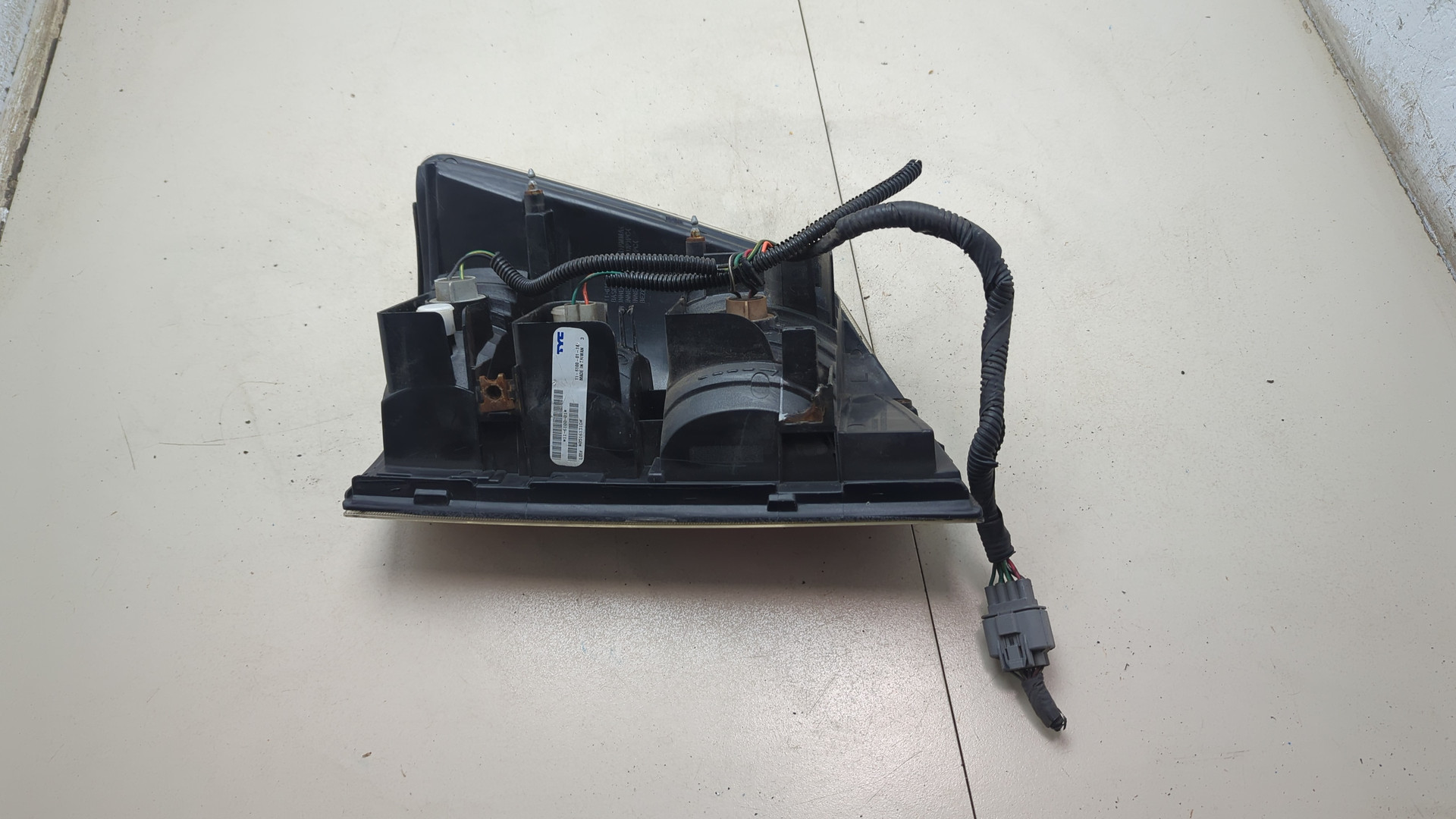 Фонарь задний левый