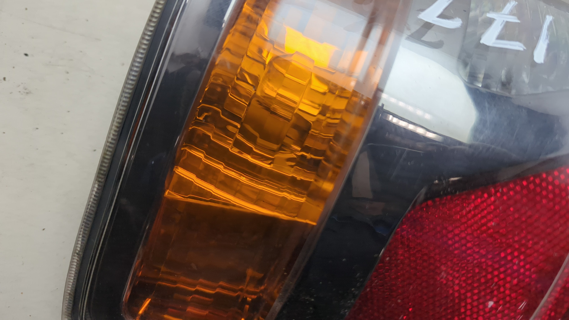 Фонарь задний левый