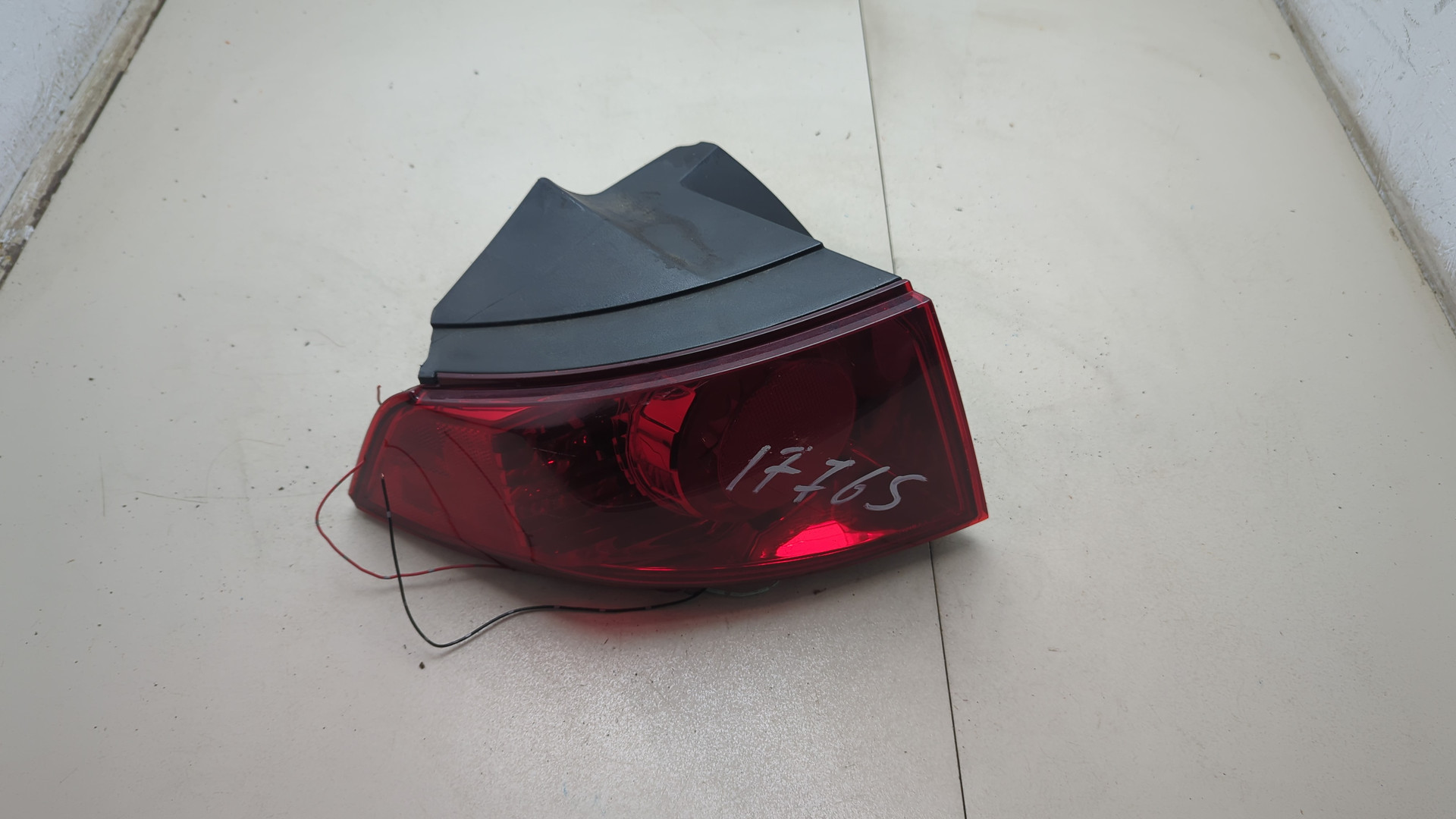 Фонарь задний левый