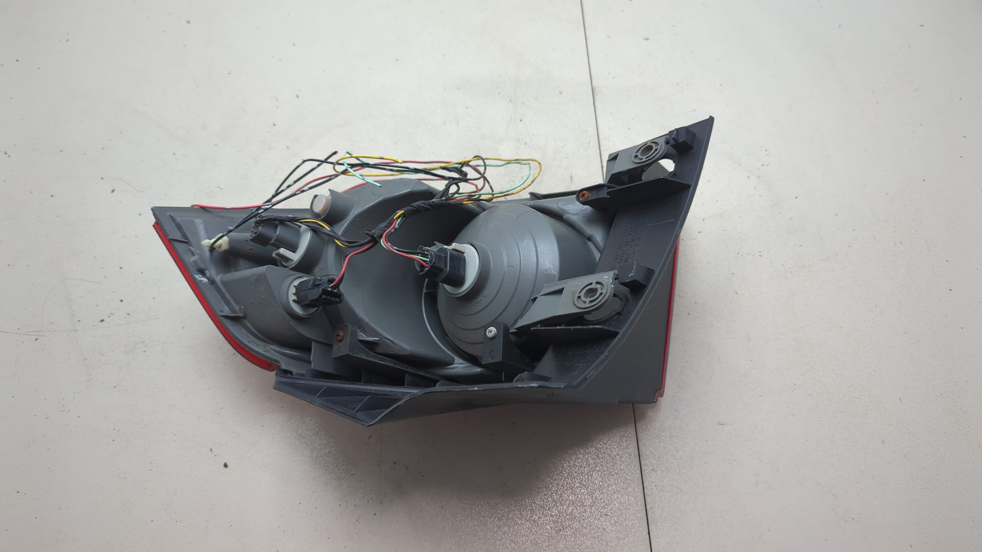 Фонарь задний левый