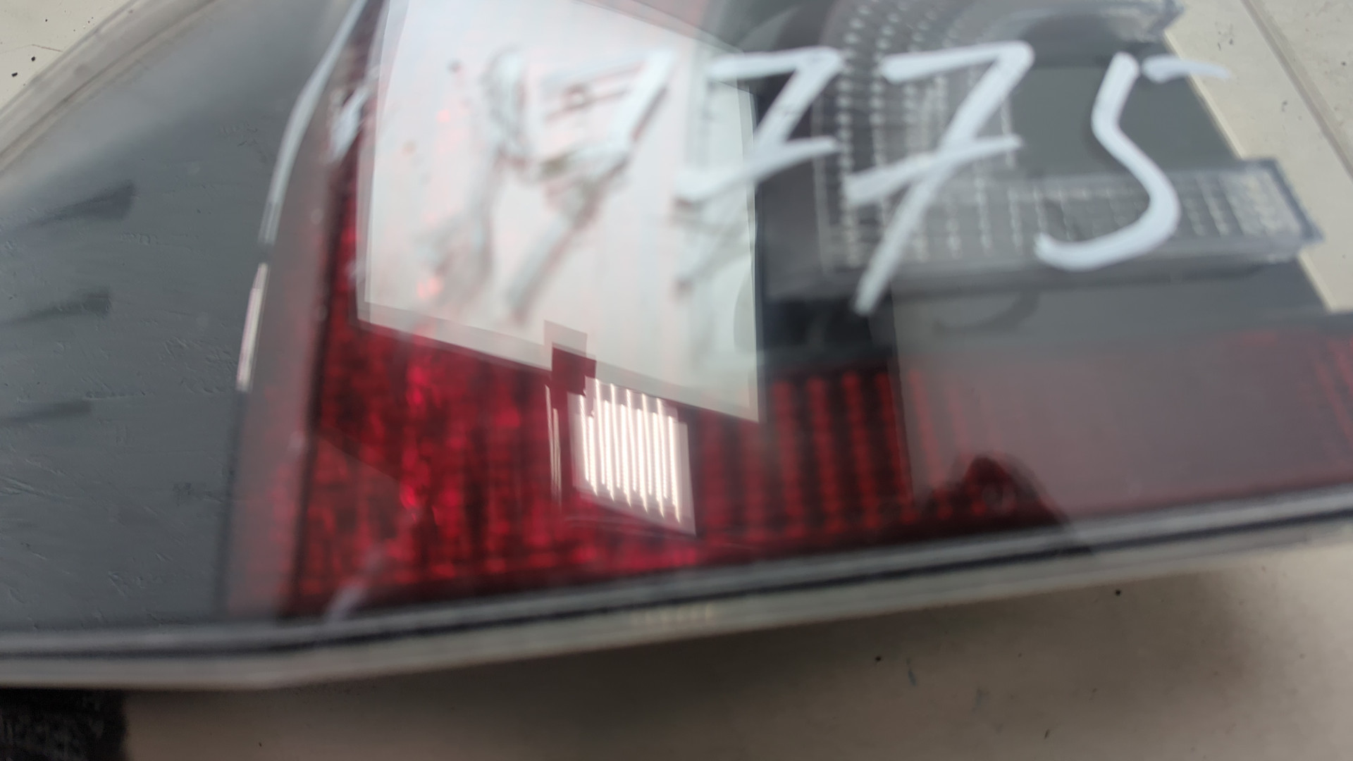 Фонарь задний левый