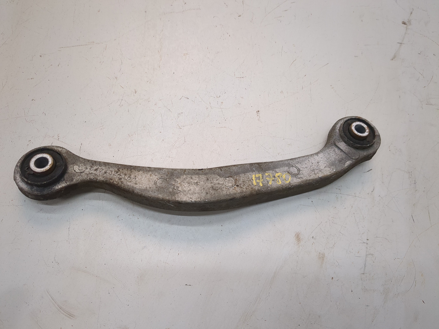 Рычаг задний левый