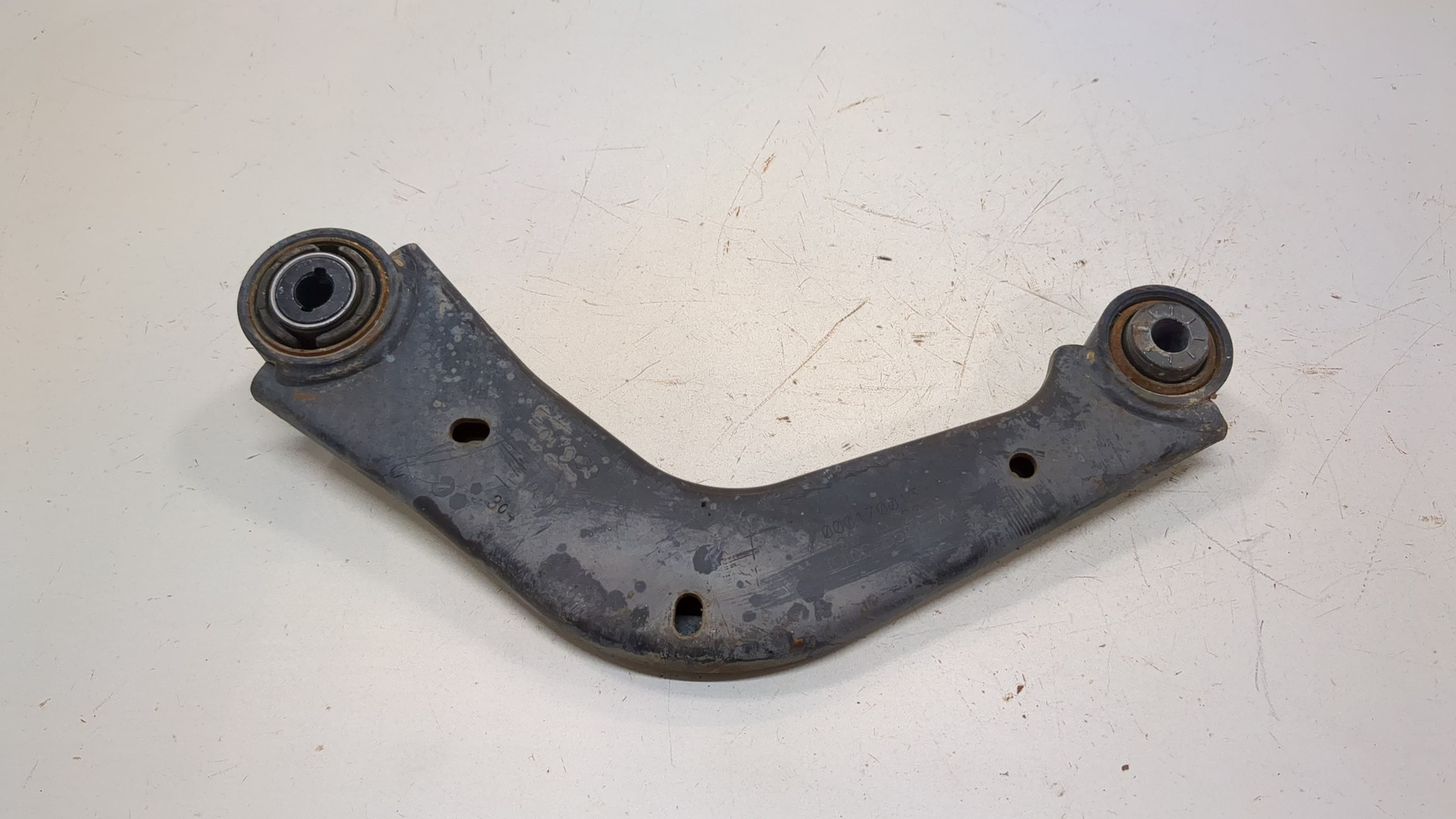 Рычаг задний левый