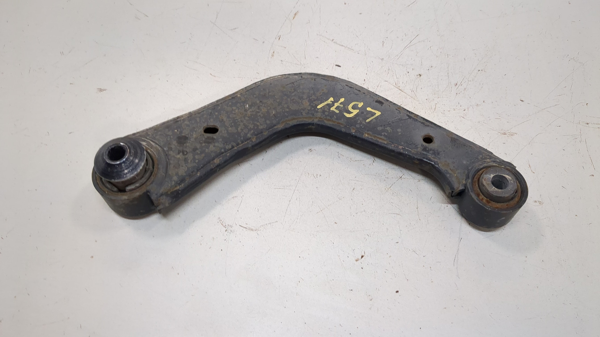 Рычаг задний левый