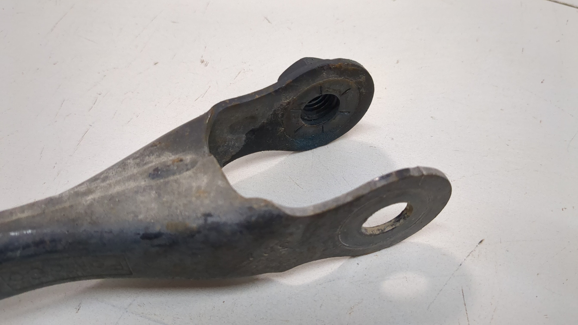 Рычаг задний