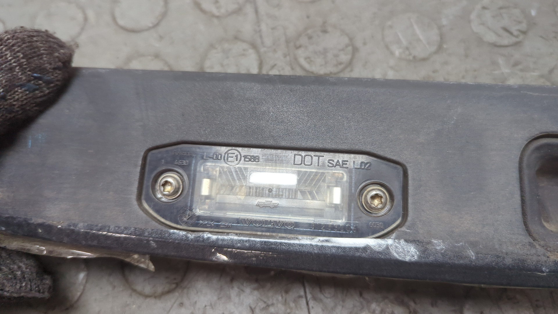 Фонарь подсветки номера