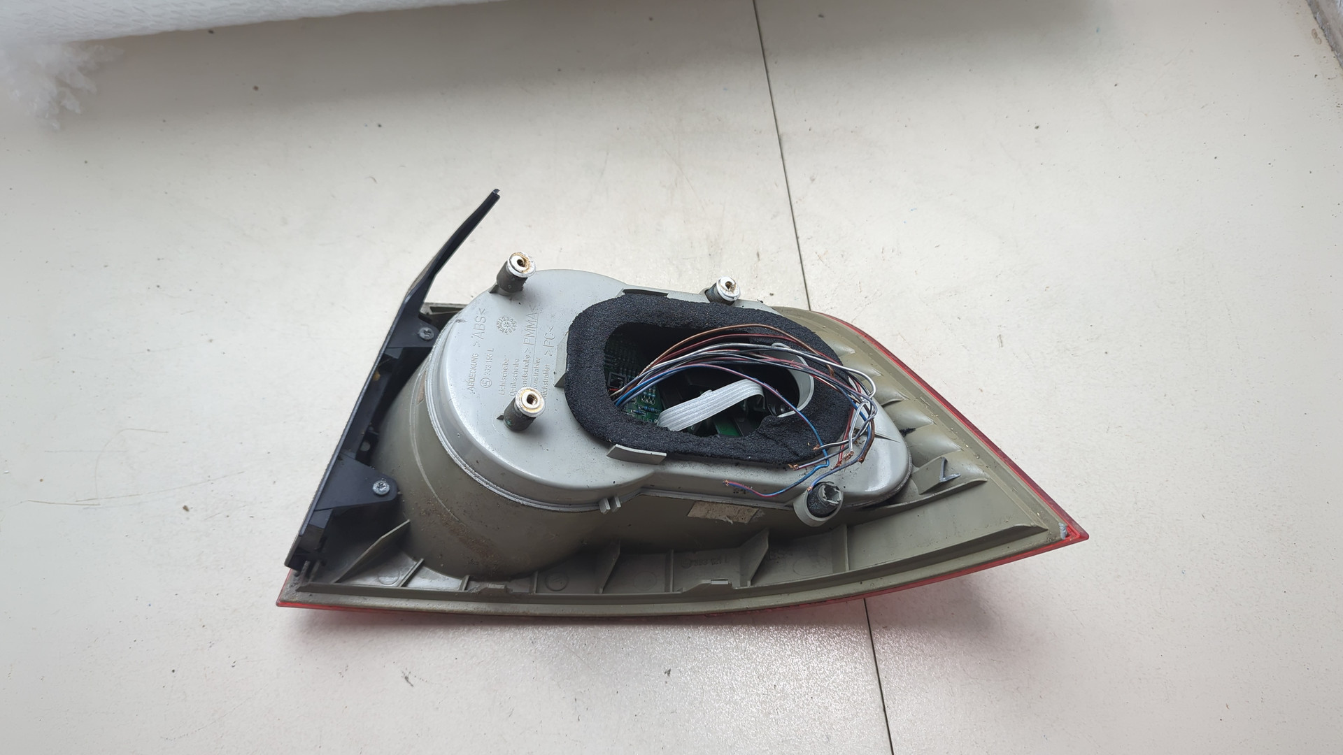 Фонарь задний левый