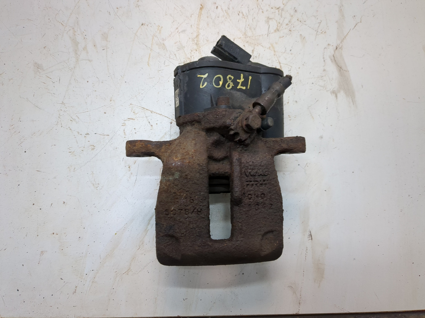 Суппорт задний левый