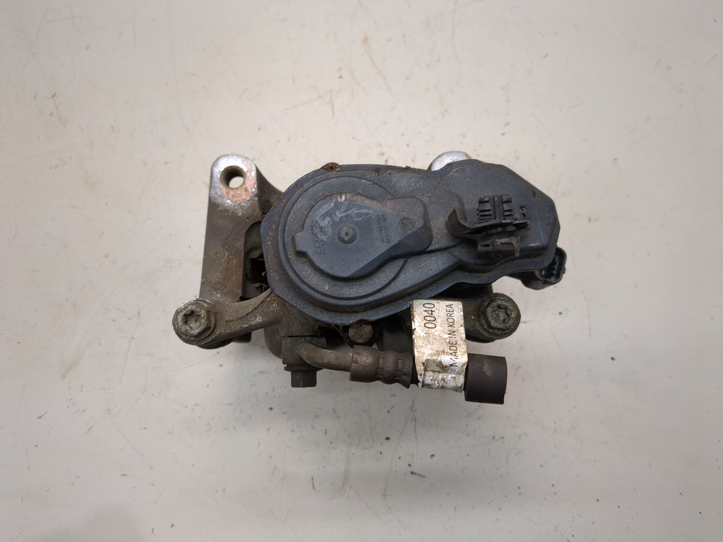 Суппорт задний левый