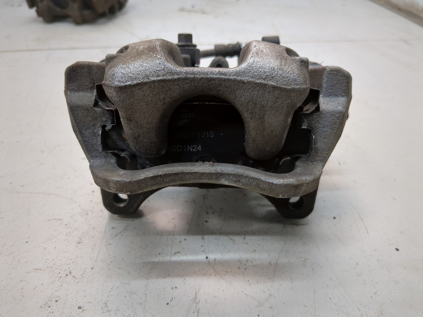 Суппорт задний левый