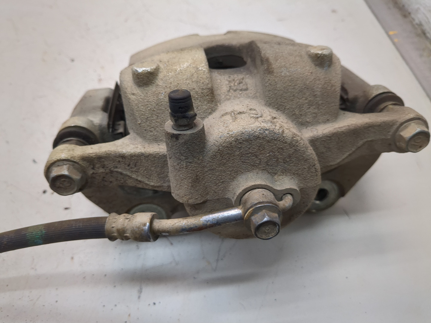 Суппорт передний левый