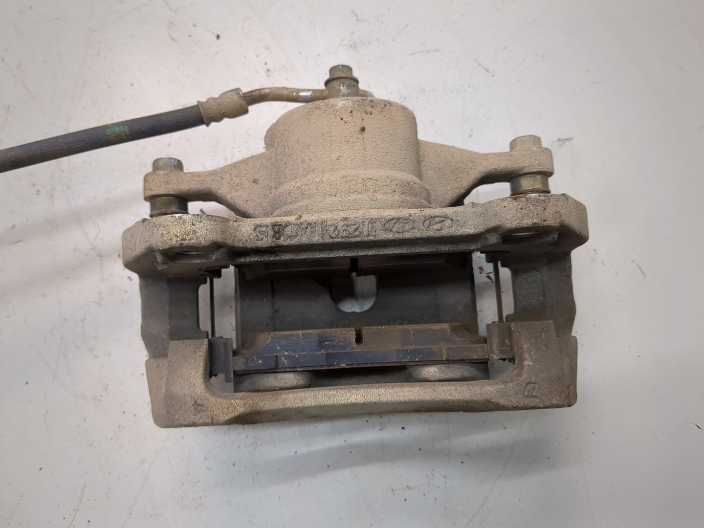 Суппорт передний левый