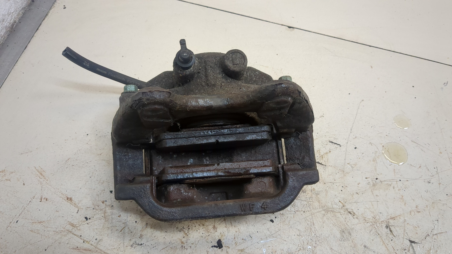 Суппорт задний левый