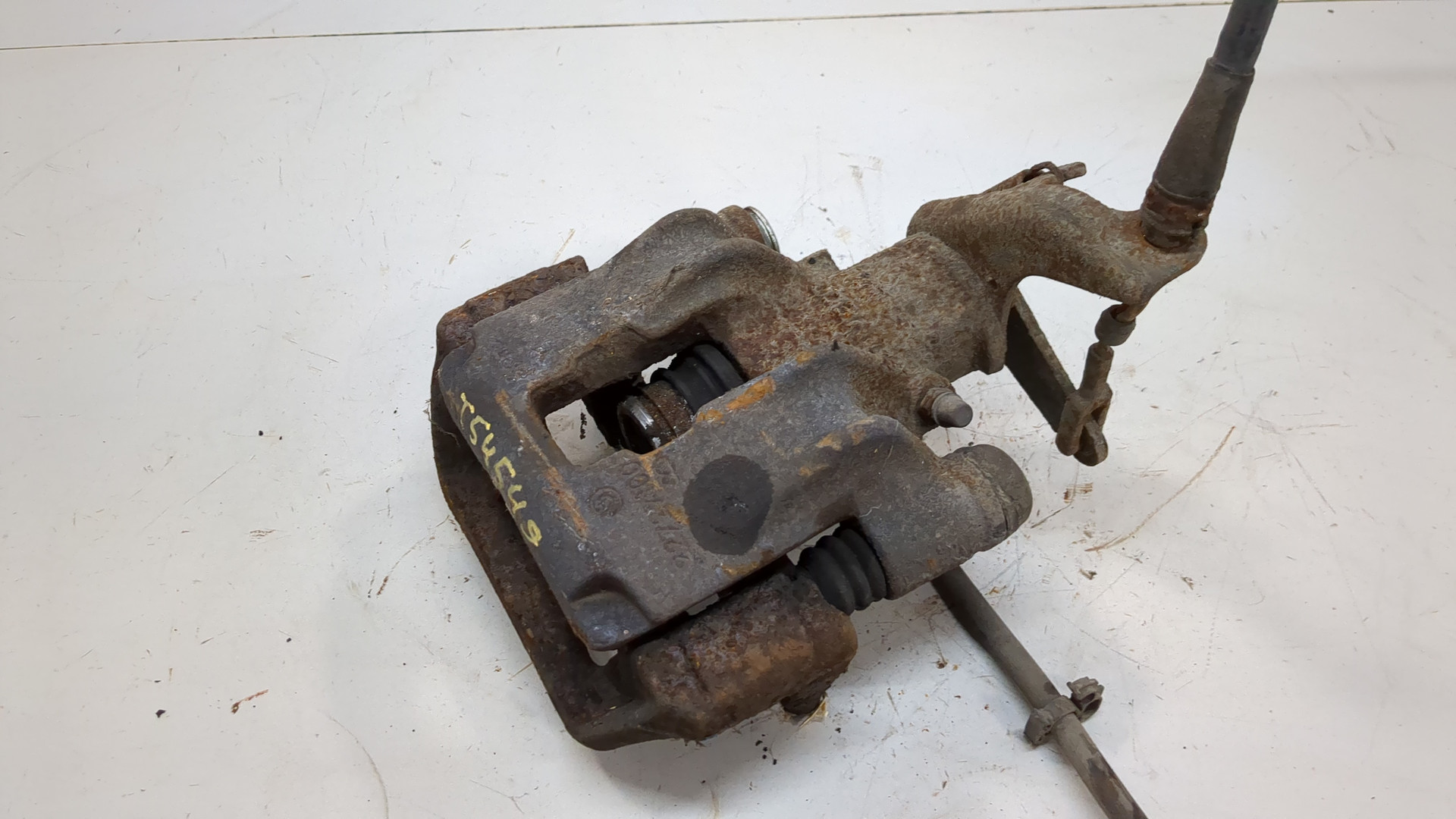 Суппорт задний левый