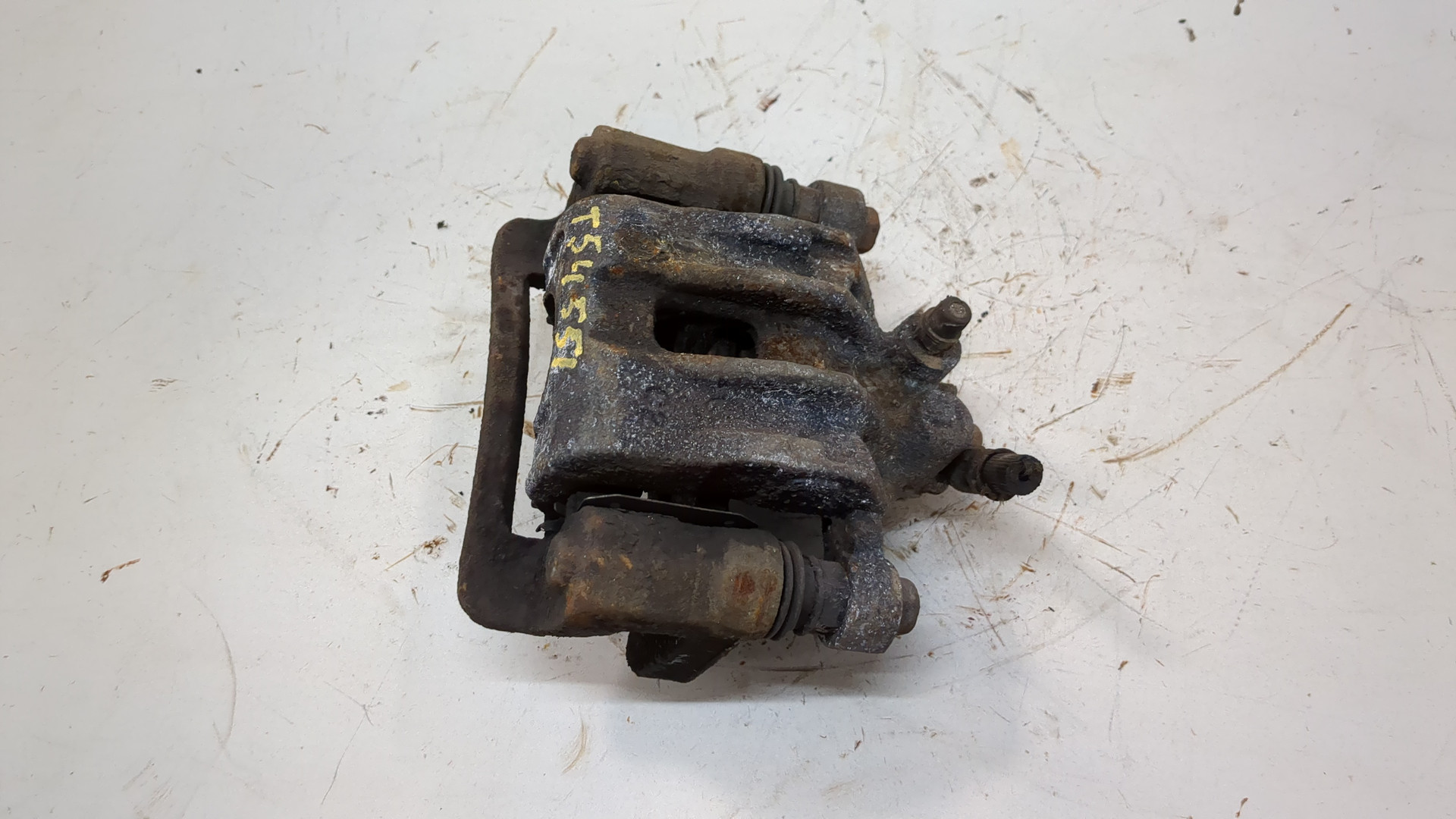 Суппорт задний левый