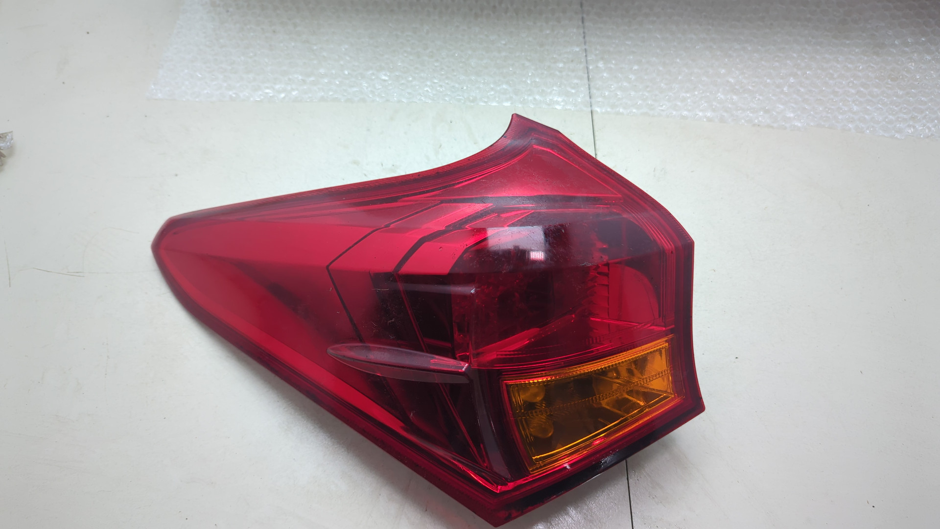 Фонарь задний левый