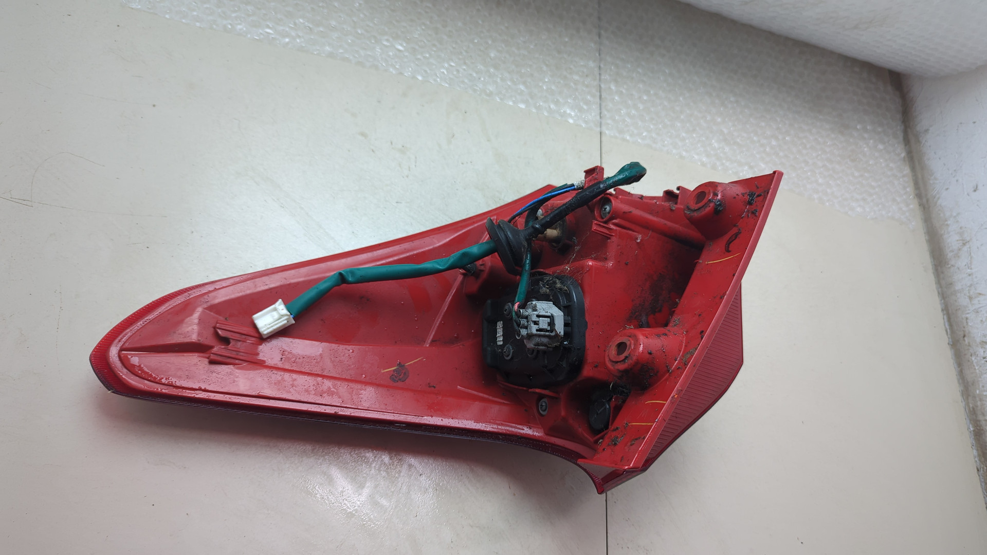 Фонарь задний левый