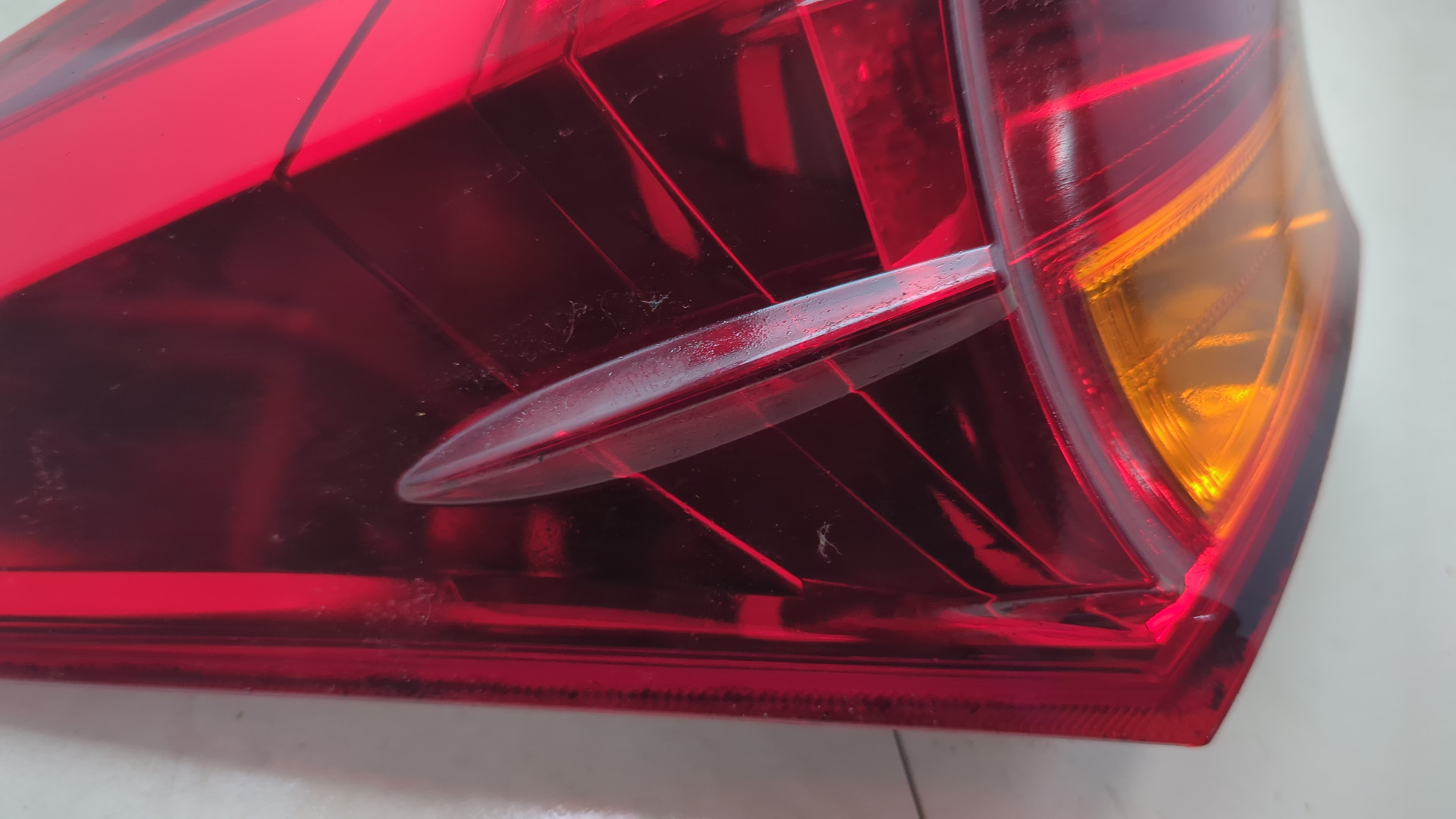 Фонарь задний левый