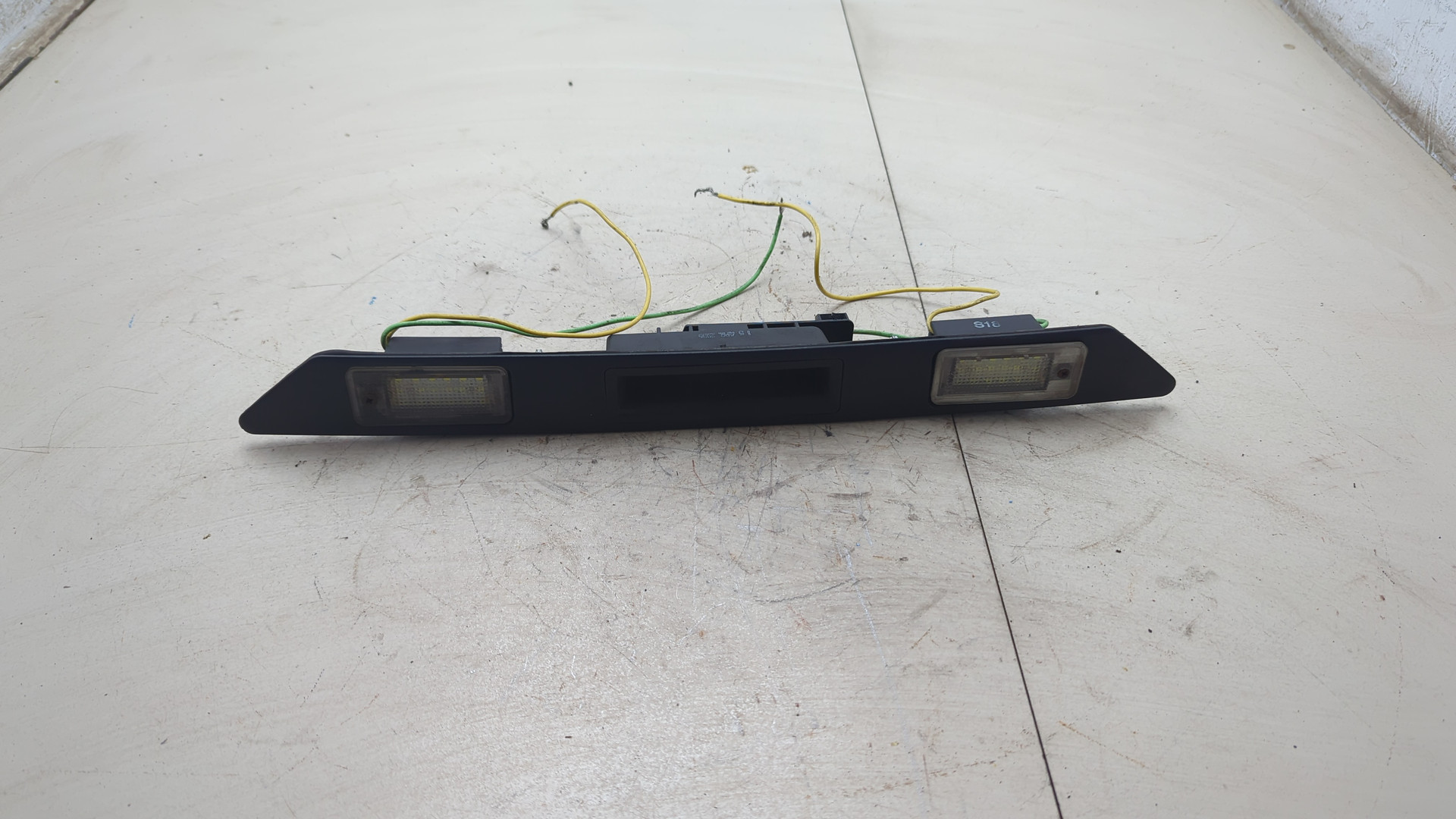 Фонарь подсветки номера