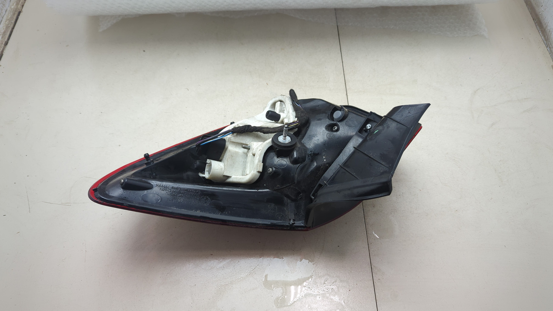 Фонарь задний левый