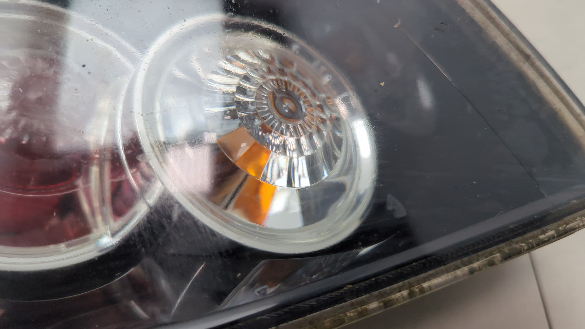 Фонарь задний левый