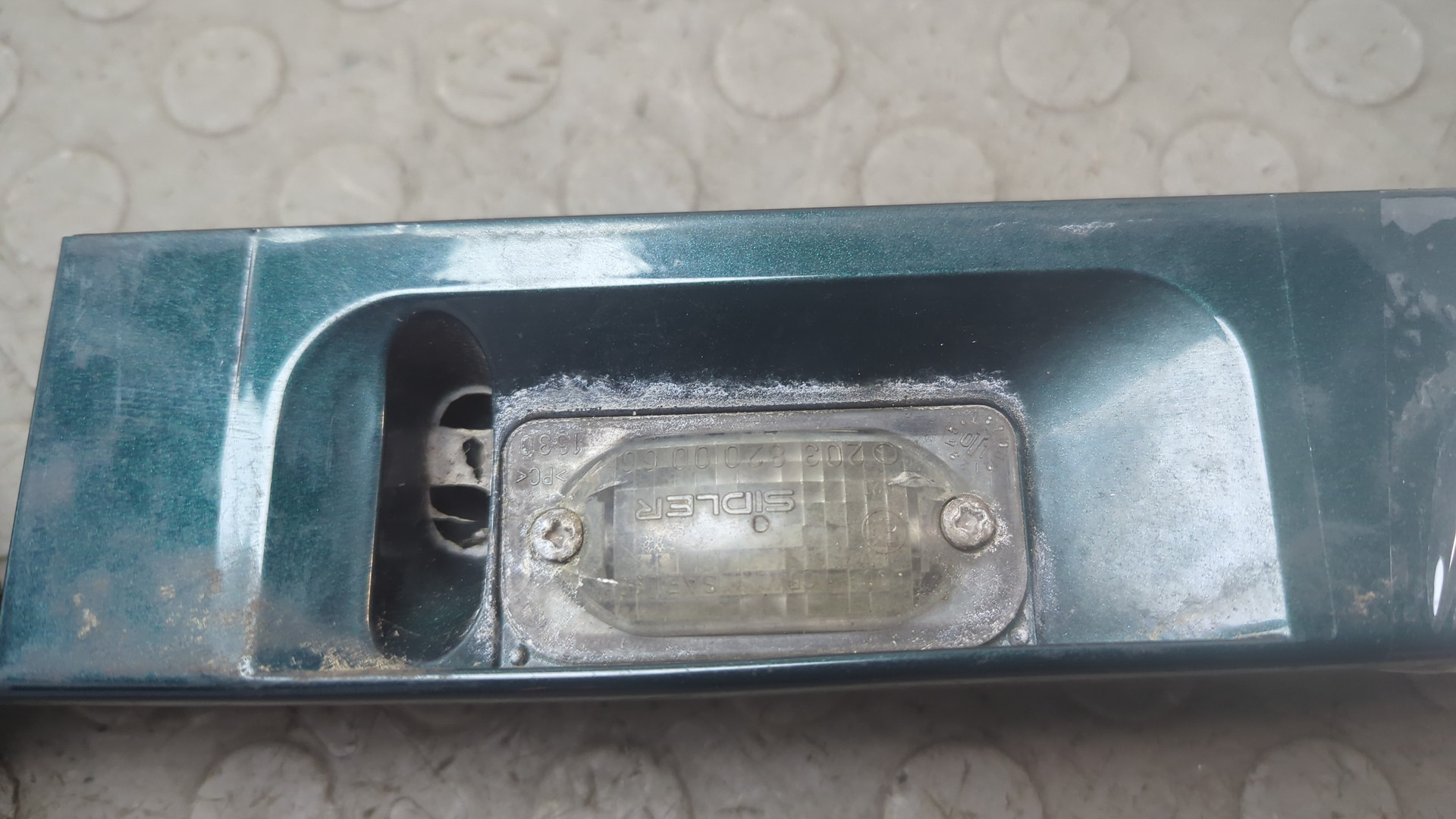 Фонарь подсветки номера