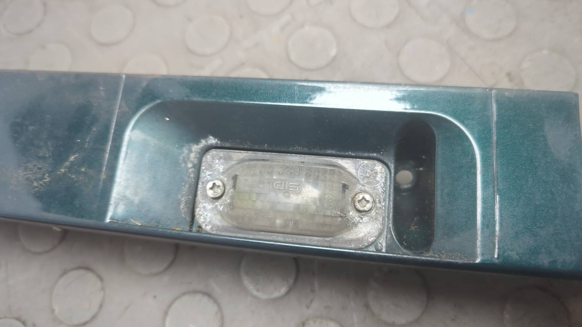 Фонарь подсветки номера