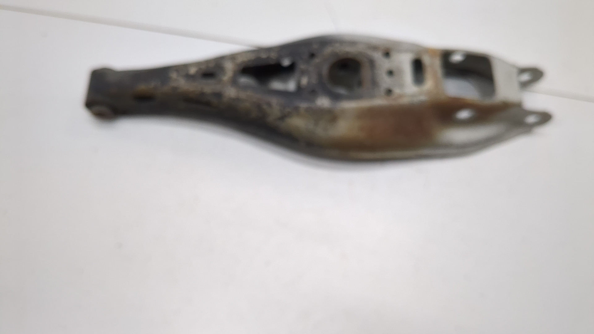 Рычаг задний