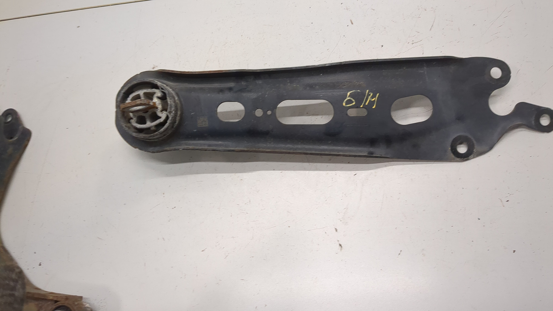 Рычаг задний левый