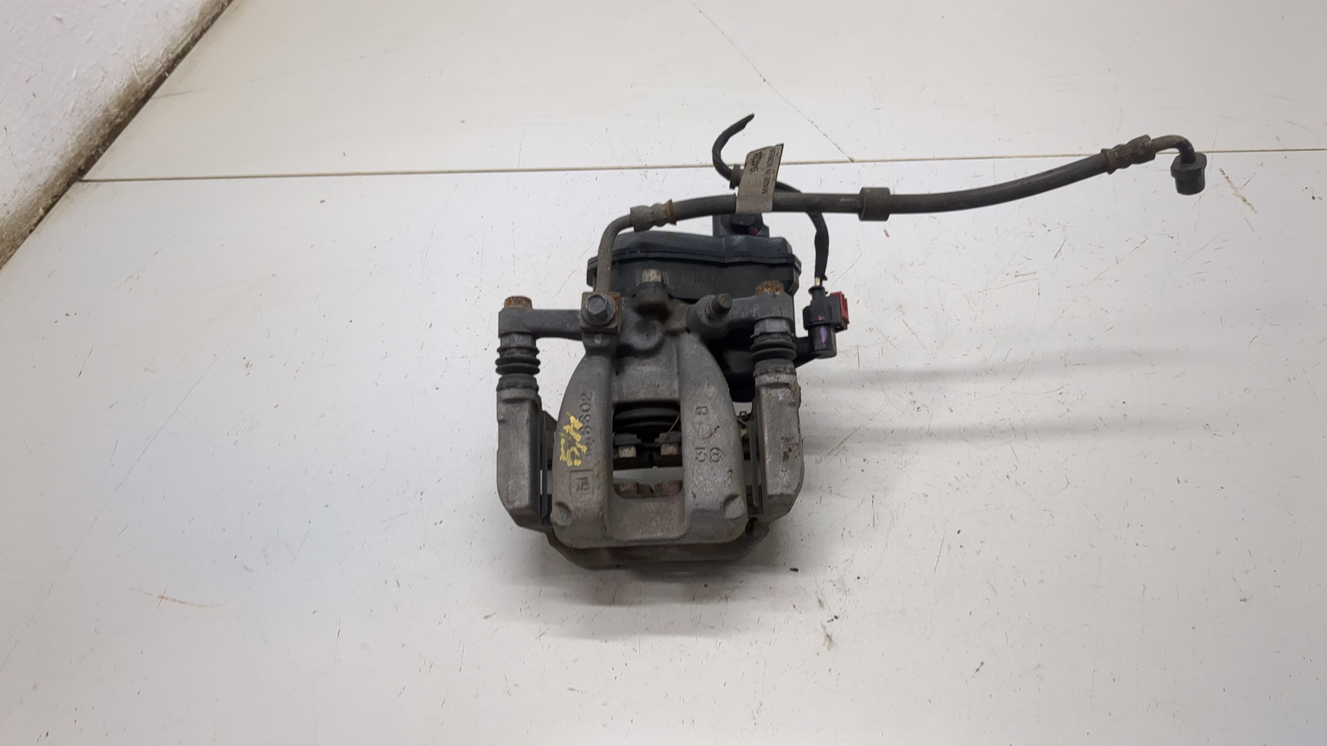 Суппорт задний левый