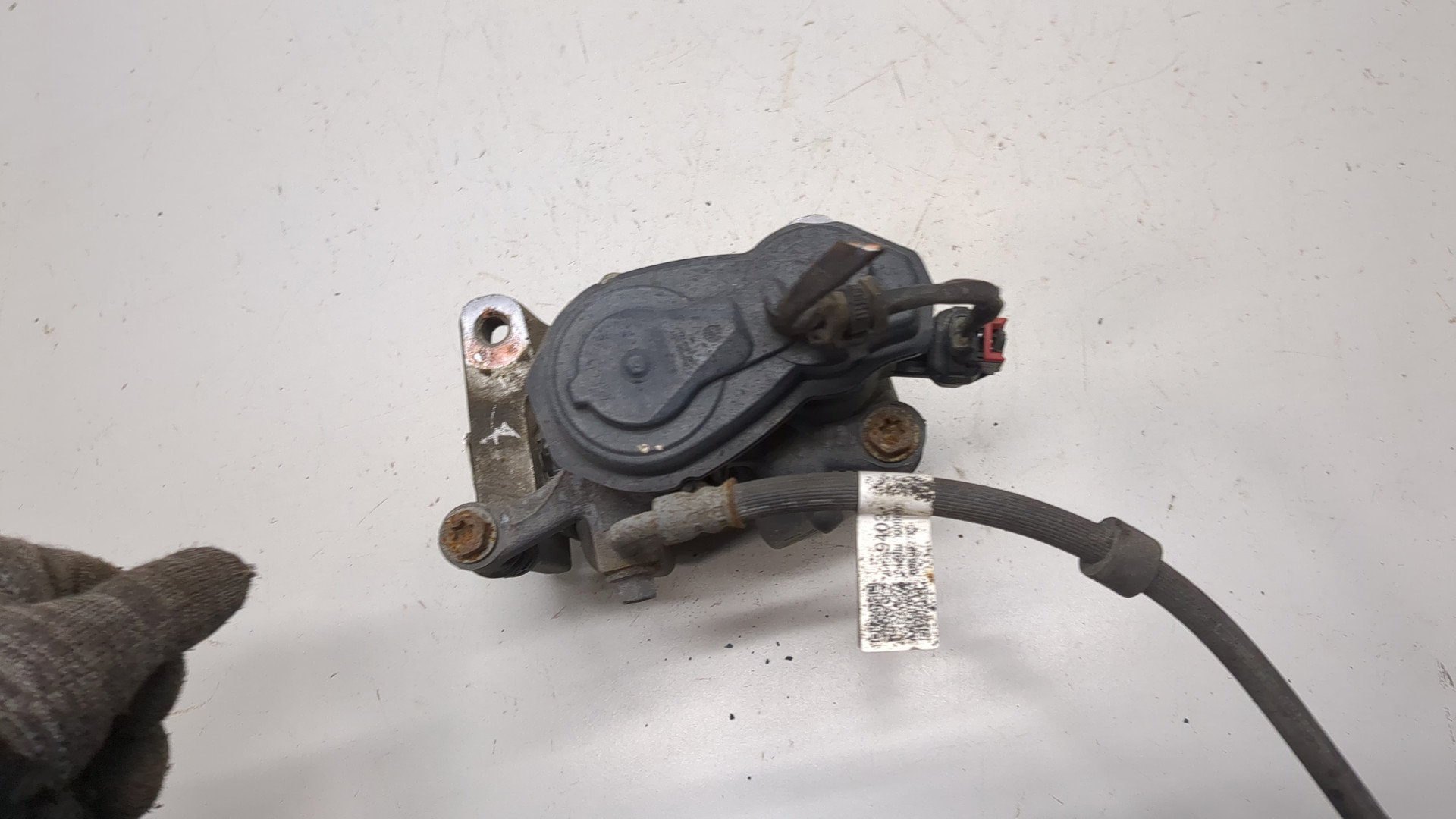 Суппорт задний левый