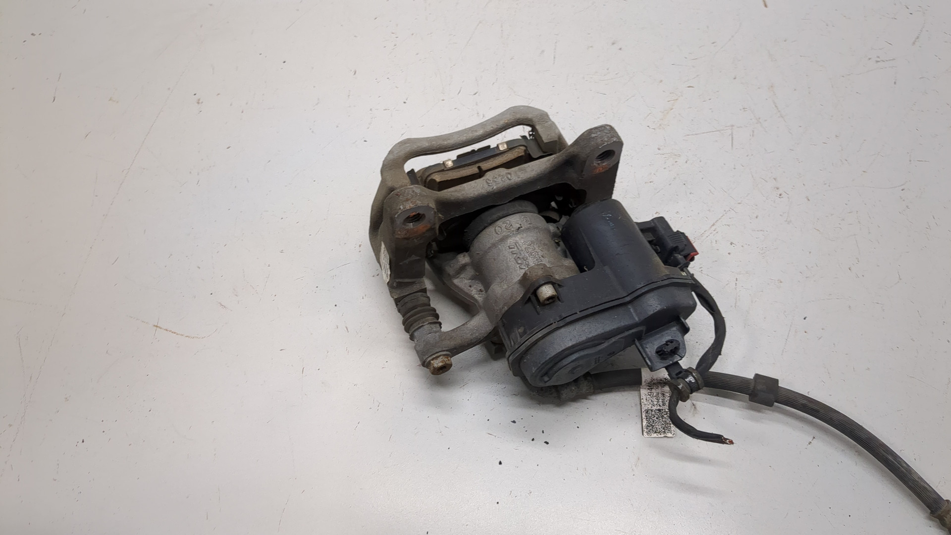 Суппорт задний левый