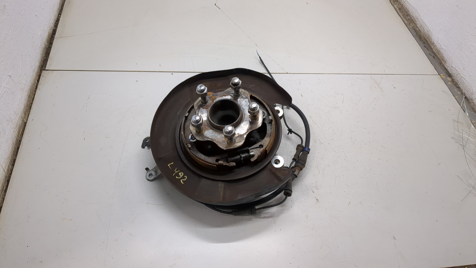 Кулак поворотный задний левый