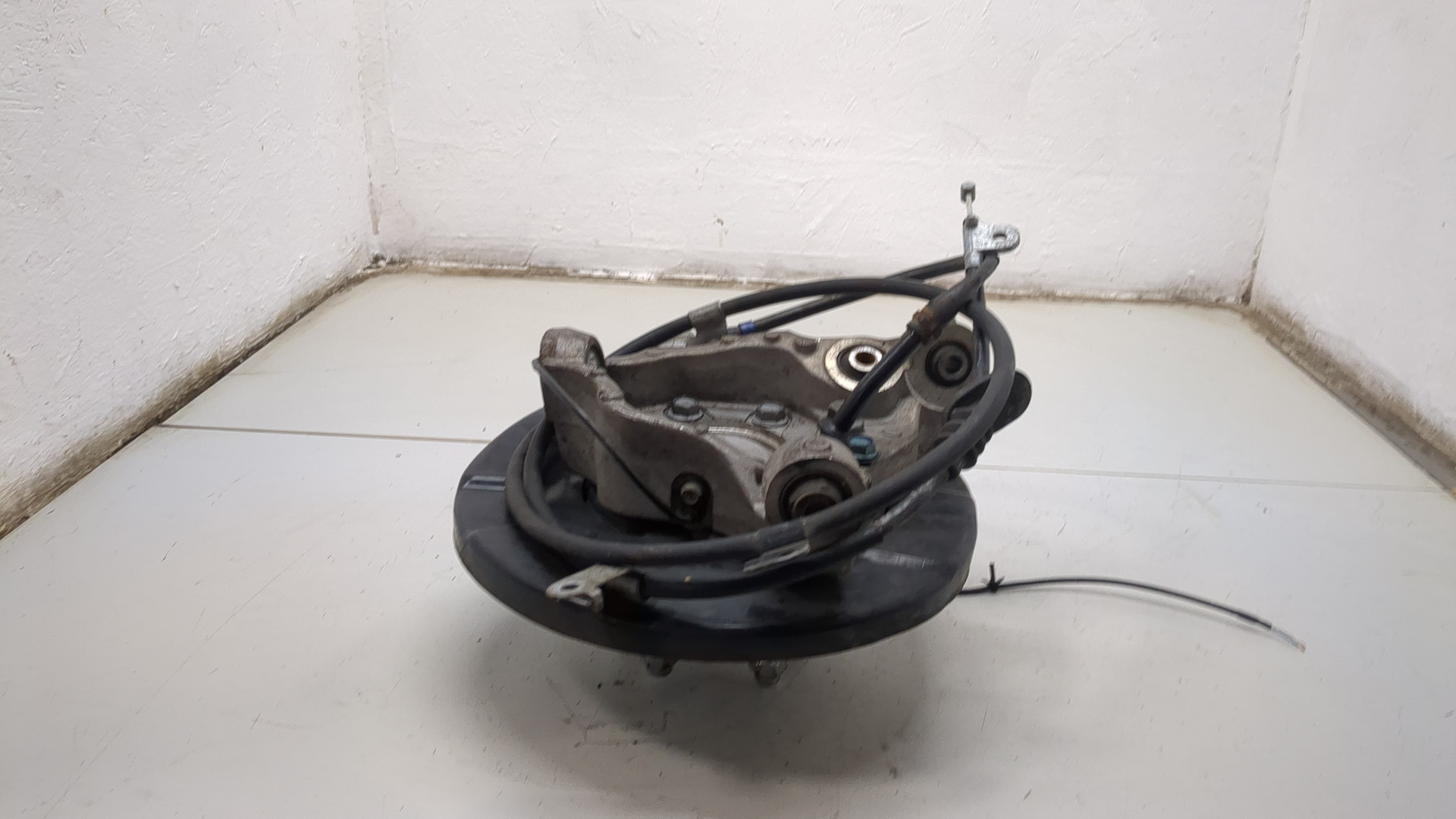 Кулак поворотный задний левый