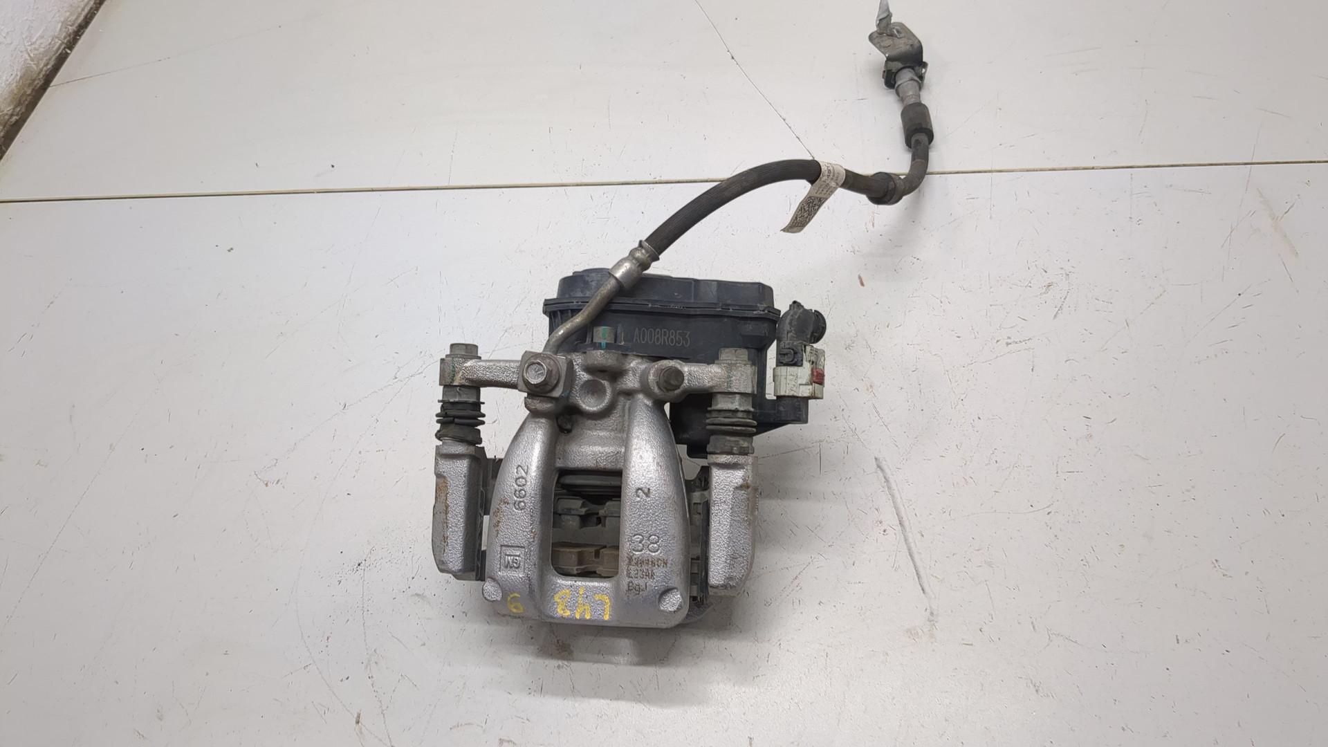 Суппорт задний левый