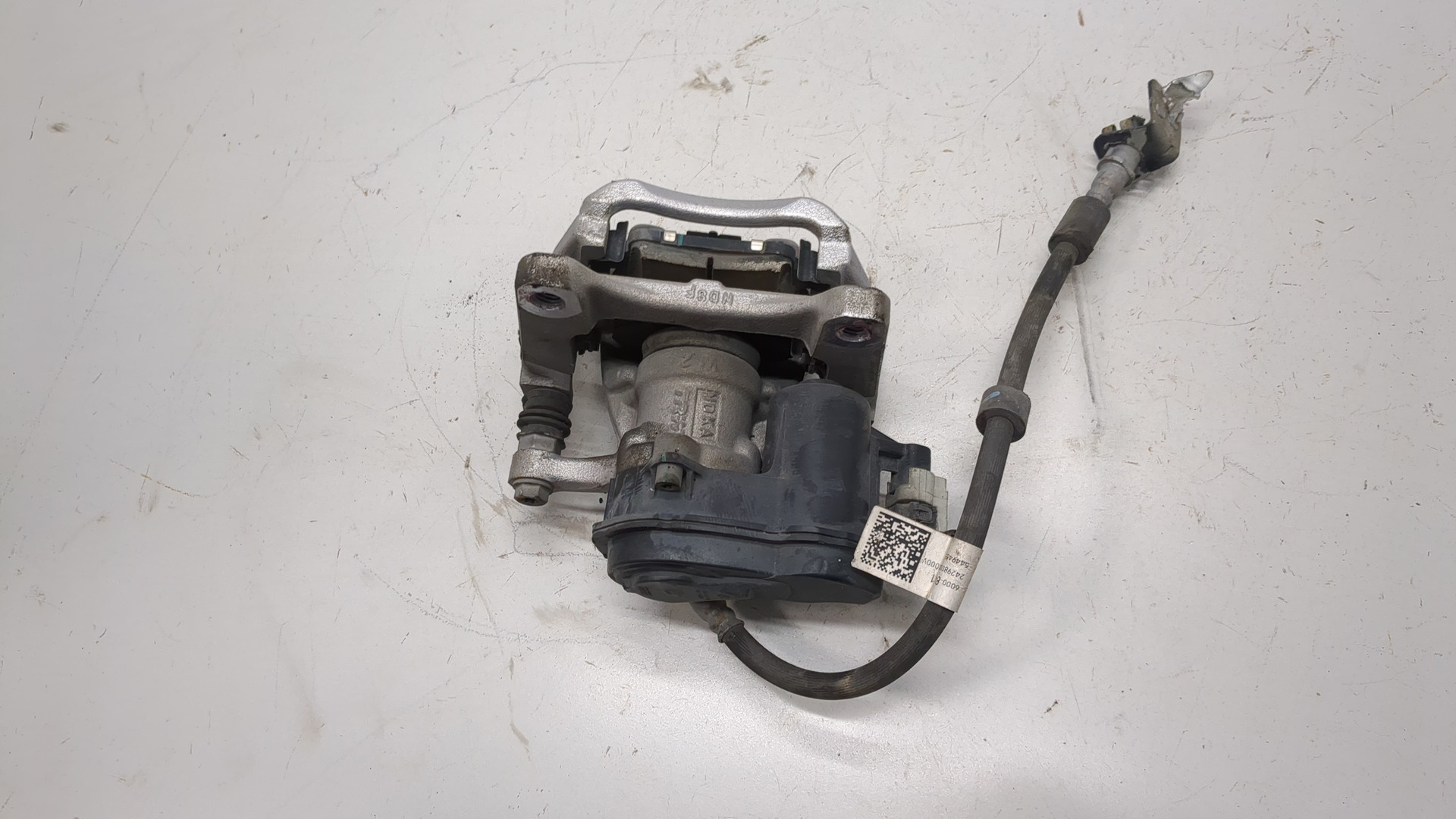 Суппорт задний левый