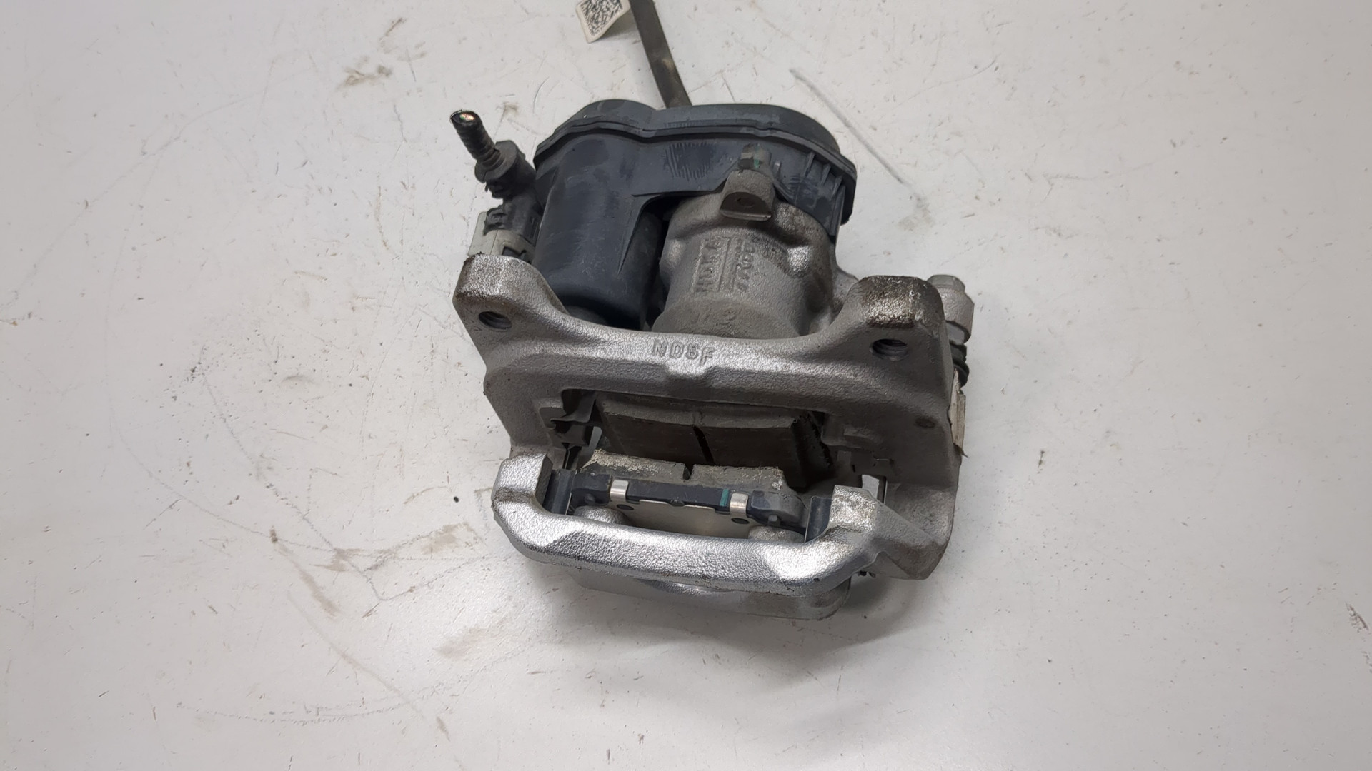 Суппорт задний левый